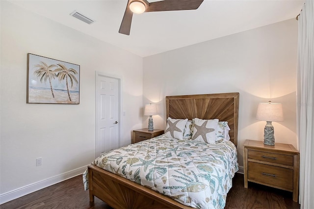 4108 Roberts Point Rd, Sarasota, FL 34242 - bedroom with wood finished floors, baseboards, and a ceiling fan