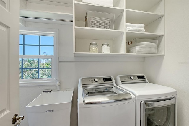 4108 Roberts Point Rd, Sarasota, FL 34242 - laundry room featuring washer and clothes dryer
