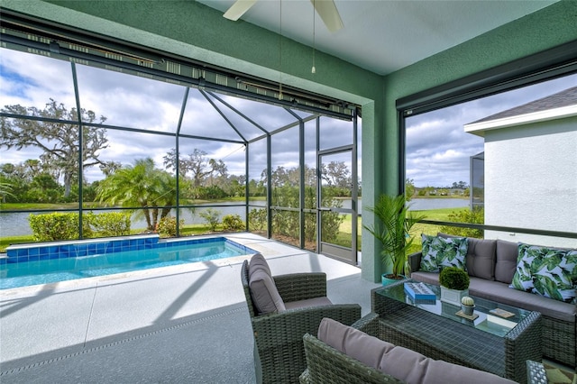 3631 Shimmering Oaks Dr, Parrish, FL 34219 - swimming pool featuring ceiling fan, a water view, an outdoor living space, a patio, and glass enclosure