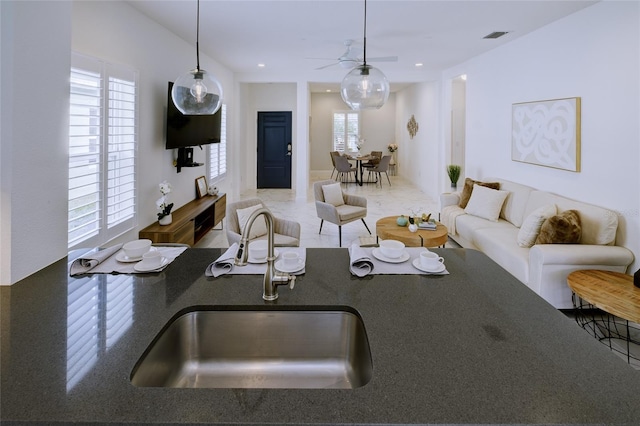 3631 Shimmering Oaks Dr, Parrish, FL 34219 - living area with ceiling fan, healthy amount of natural light, and recessed lighting