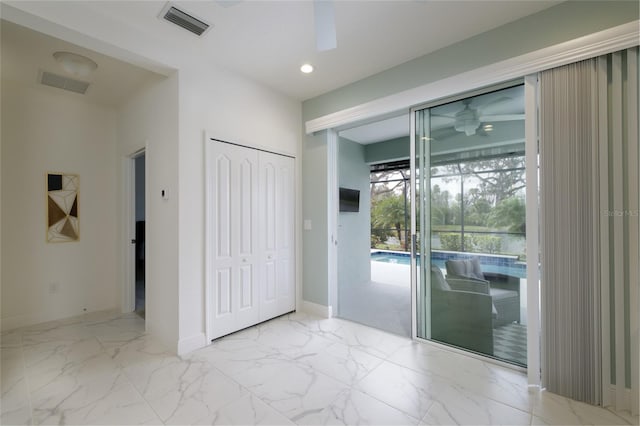 3631 Shimmering Oaks Dr, Parrish, FL 34219 - spare room with ceiling fan, marble finish flooring, baseboards, and recessed lighting
