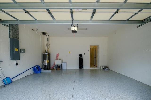 3631 Shimmering Oaks Dr, Parrish, FL 34219 - garage with electric panel, gas water heater, a sink, and a garage door opener