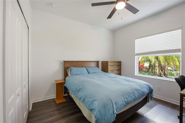 5020 Torrey Pines Run, Bradenton, FL 34211 - bedroom with baseboards, a closet, wood finished floors, and ceiling fan