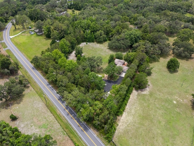 22063 Lake Lindsey Rd, Brooksville, FL 34601 - aerial overview of property's location featuring a heavily wooded area
