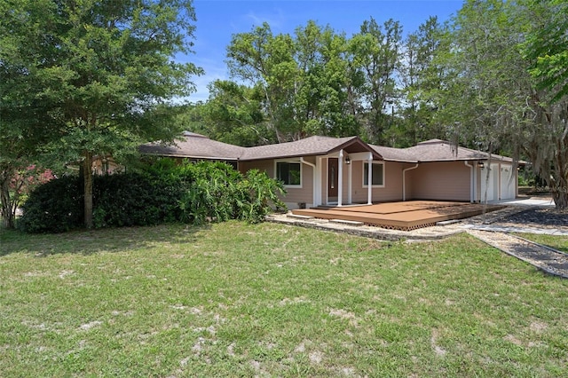 22063 Lake Lindsey Rd, Brooksville, FL 34601 - ranch-style house with an attached garage and a front lawn