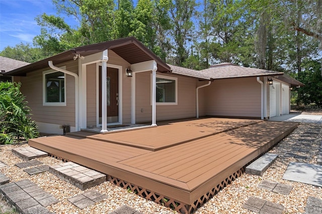 22063 Lake Lindsey Rd, Brooksville, FL 34601 - wooden terrace featuring a garage