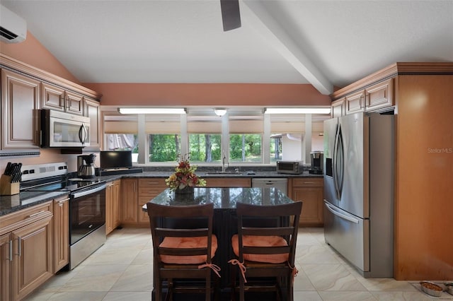 22063 Lake Lindsey Rd, Brooksville, FL 34601 - kitchen featuring stainless steel appliances, a wall unit AC, a sink, and dark stone counters
