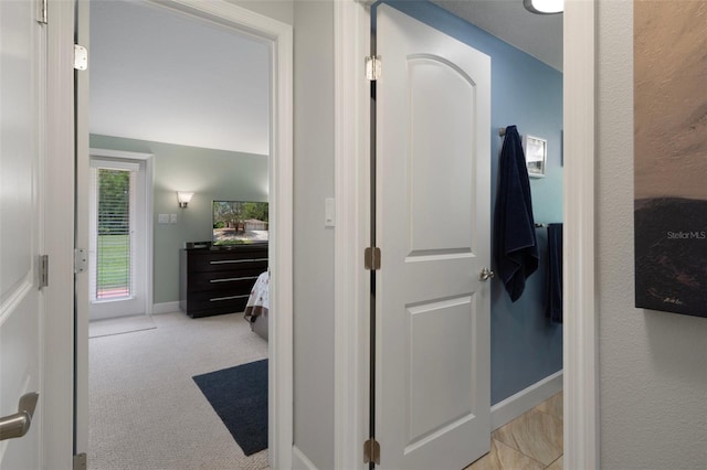 22063 Lake Lindsey Rd, Brooksville, FL 34601 - hallway with baseboards and carpet