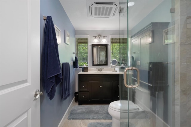 22063 Lake Lindsey Rd, Brooksville, FL 34601 - full bath featuring a wall mounted AC, vanity, a stall shower, toilet, and baseboards