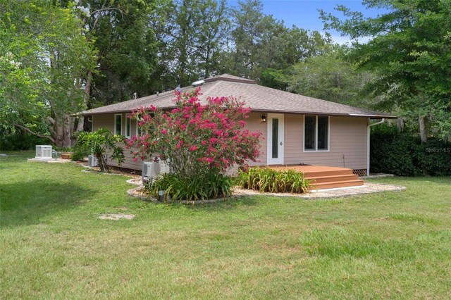22063 Lake Lindsey Rd, Brooksville, FL 34601 - view of front of property with a front yard