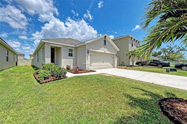 4206 Park Willow Ave, Palmetto, FL 34221 - ranch-style home featuring stucco siding, driveway, a garage, and a front yard