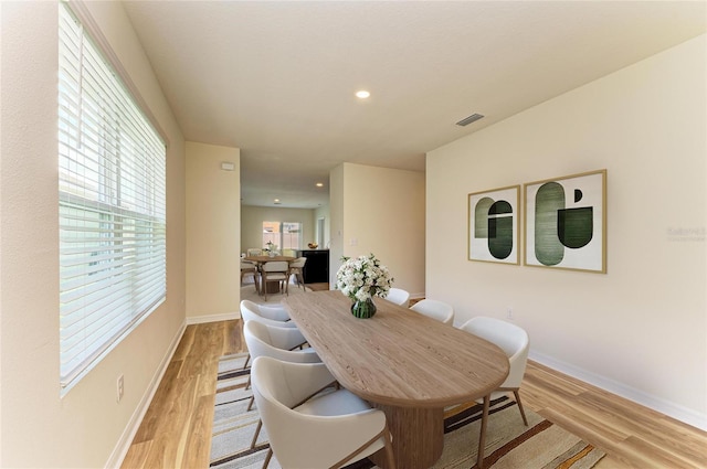4206 Park Willow Ave, Palmetto, FL 34221 - dining room with light wood-style flooring, baseboards, and recessed lighting