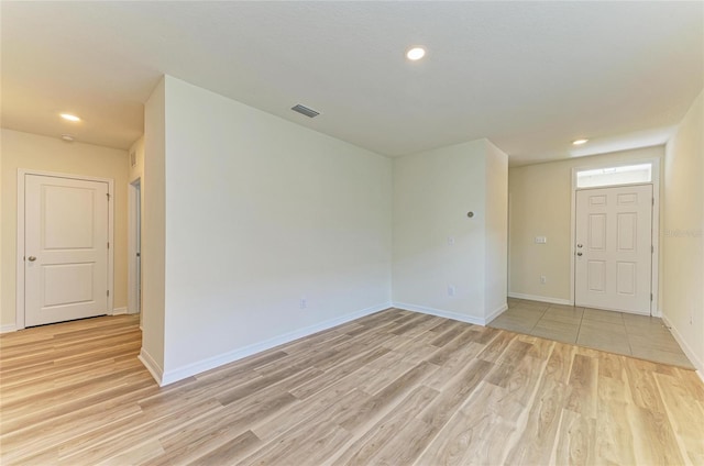 4206 Park Willow Ave, Palmetto, FL 34221 - unfurnished room featuring light wood-style flooring, baseboards, and recessed lighting