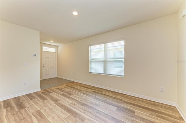 4206 Park Willow Ave, Palmetto, FL 34221 - unfurnished room with light wood-style floors, baseboards, and recessed lighting