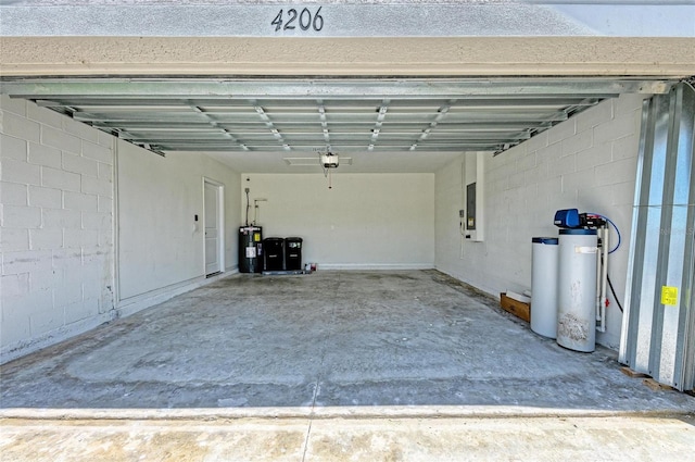 4206 Park Willow Ave, Palmetto, FL 34221 - garage with water heater, electric panel, and concrete block wall