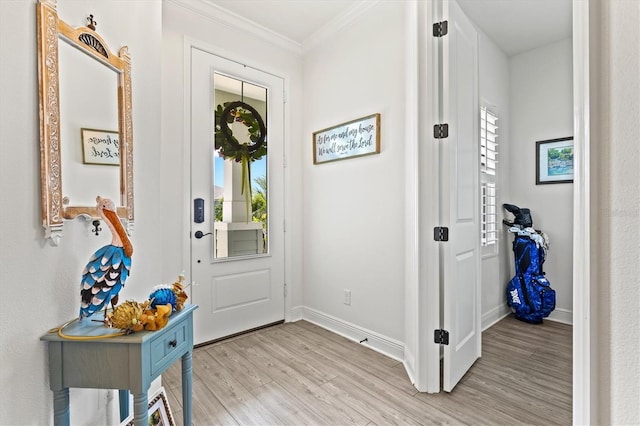 13849 Old Creek Ct, Parrish, FL 34219 - entryway featuring light wood-style floors, ornamental molding, and baseboards