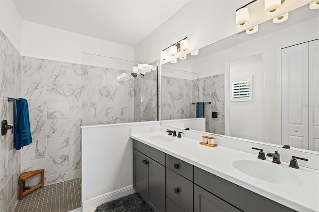 13849 Old Creek Ct, Parrish, FL 34219 - full bathroom featuring double vanity, a walk in shower, and tile walls