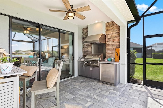 13849 Old Creek Ct, Parrish, FL 34219 - sunroom / solarium with an outdoor kitchen and a ceiling fan