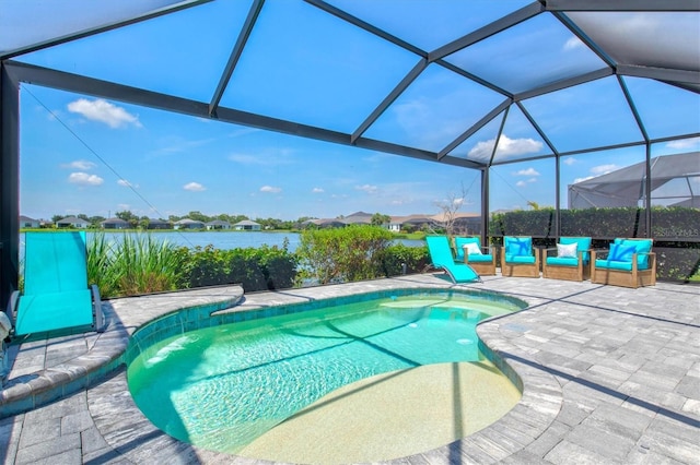 13849 Old Creek Ct, Parrish, FL 34219 - swimming pool featuring a patio area, a water view, and glass enclosure