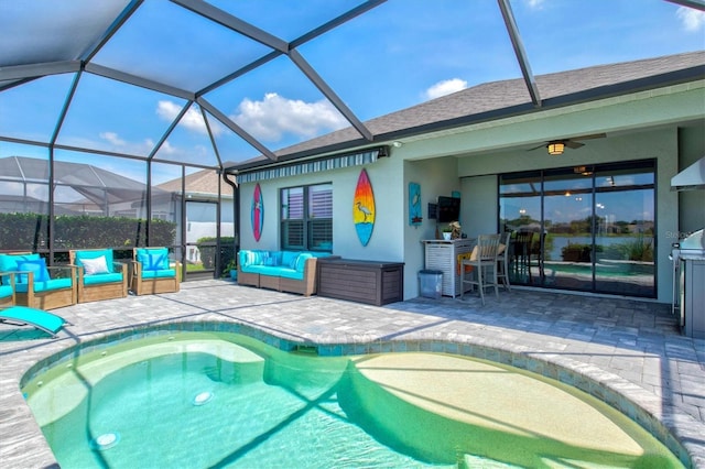 13849 Old Creek Ct, Parrish, FL 34219 - swimming pool featuring a patio, outdoor lounge area, glass enclosure, and a ceiling fan