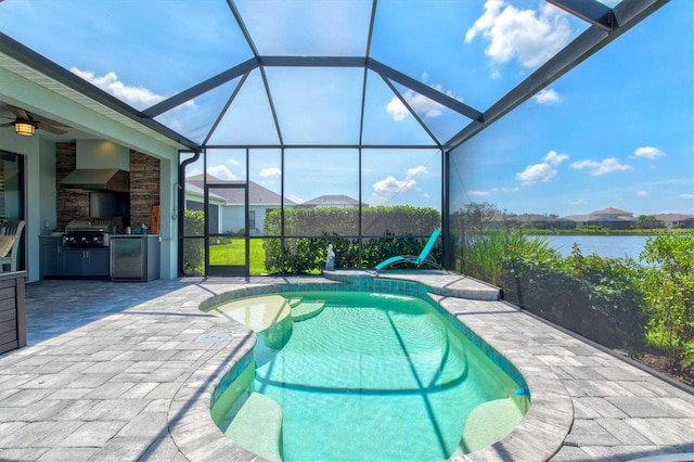 13849 Old Creek Ct, Parrish, FL 34219 - outdoor pool with a patio area, ceiling fan, and glass enclosure