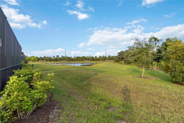 2794 Butterfly Jasmine Trl, Sarasota, FL 34240 - view of green lawn featuring a water view