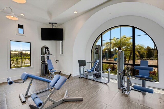 2794 Butterfly Jasmine Trl, Sarasota, FL 34240 - exercise room featuring baseboards and recessed lighting