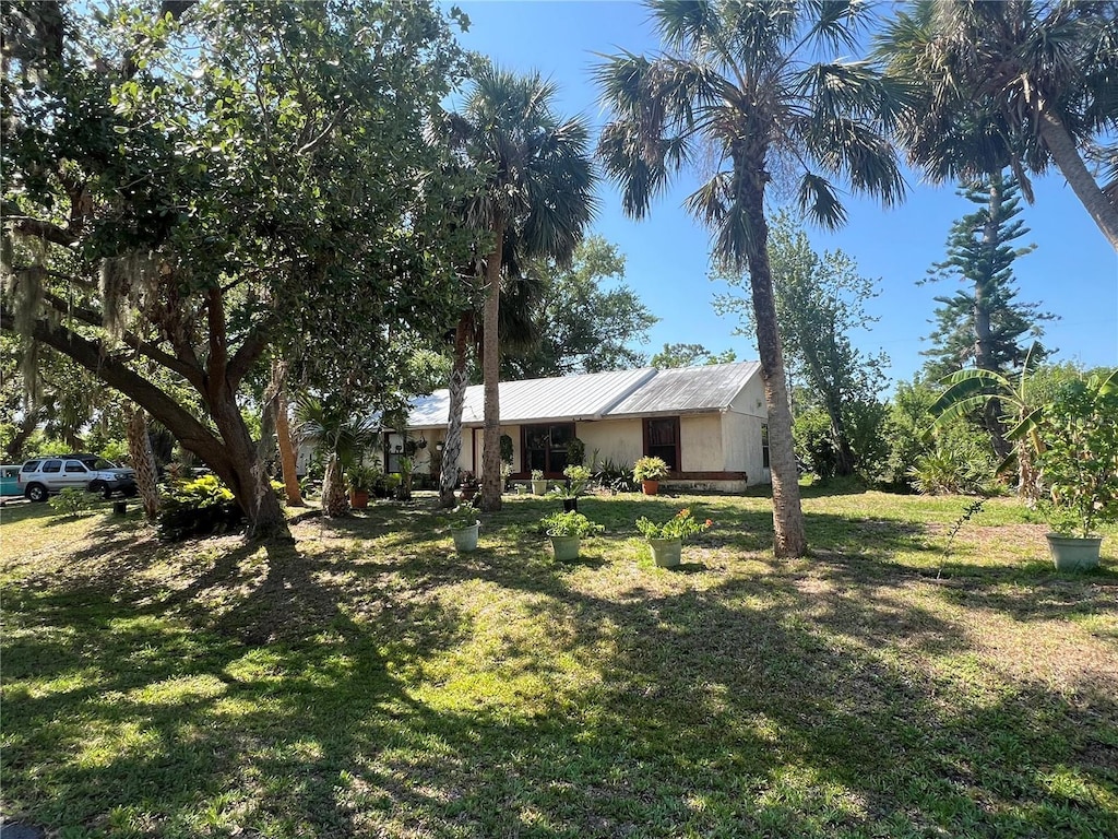 12127 Hunter Ave, Port Charlotte, FL 33953 - view of green lawn