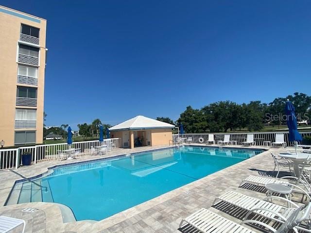 4570 Pinebrook Cir Unit 508, Bradenton, FL 34209 - community pool featuring a patio