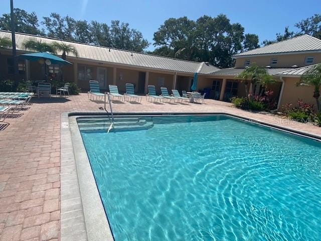 4570 Pinebrook Cir Unit 508, Bradenton, FL 34209 - community pool with a patio area