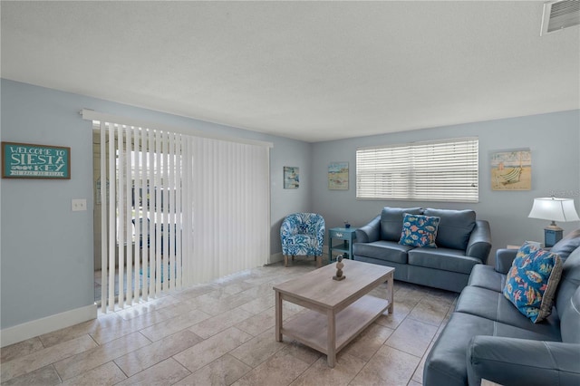 6150 Midnight Pass Rd Unit V4, Sarasota, FL 34242 - living area featuring baseboards