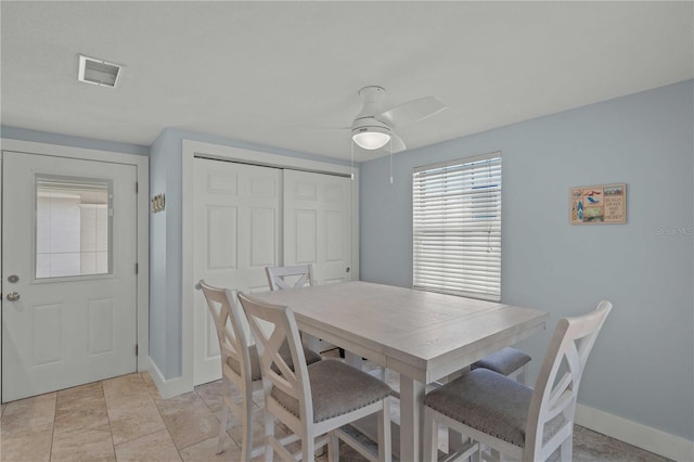 6150 Midnight Pass Rd Unit V4, Sarasota, FL 34242 - dining area with ceiling fan and baseboards