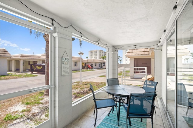 6150 Midnight Pass Rd Unit V4, Sarasota, FL 34242 - sunroom / solarium with healthy amount of natural light