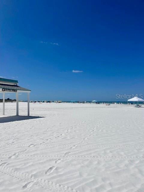 6150 Midnight Pass Rd Unit V4, Sarasota, FL 34242 - view of yard with view of water and beach and a carport