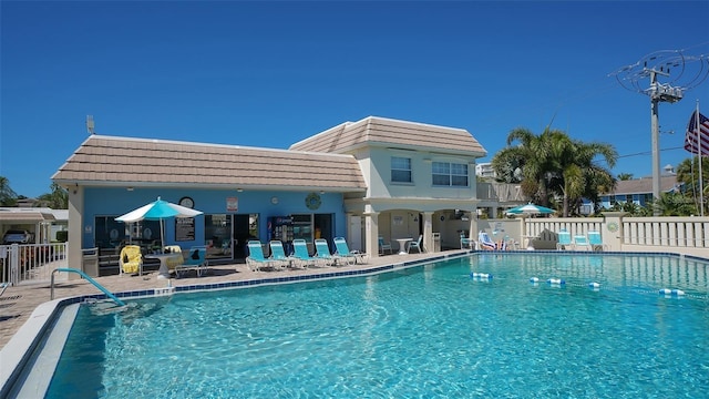 6150 Midnight Pass Rd Unit V4, Sarasota, FL 34242 - community pool with a patio area
