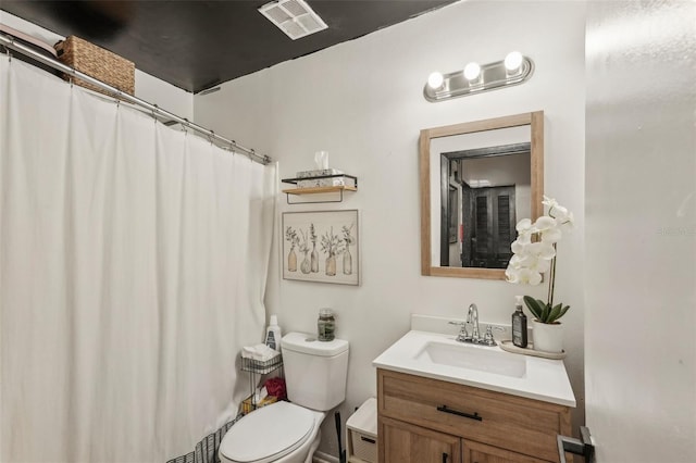 3881 Holin Ln, North Port, FL 34287 - full bathroom featuring toilet, vanity, and curtained shower