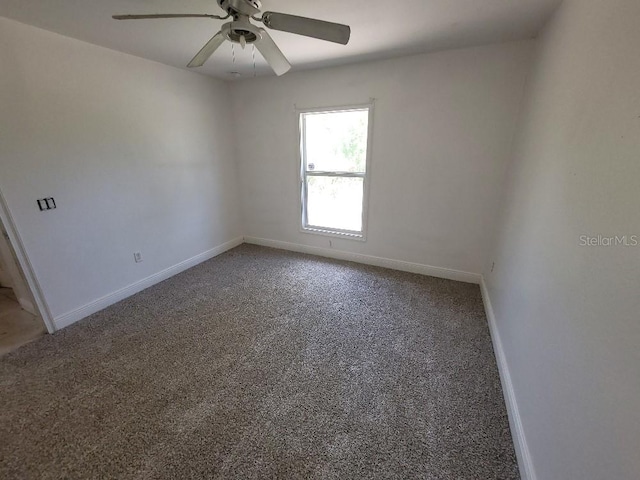 1422 Jakway Rd, North Port, FL 34288 - carpeted spare room featuring baseboards and a ceiling fan