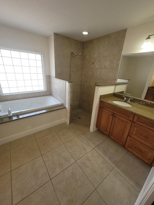 1422 Jakway Rd, North Port, FL 34288 - full bath with a garden tub, a tile shower, vanity, and tile patterned flooring