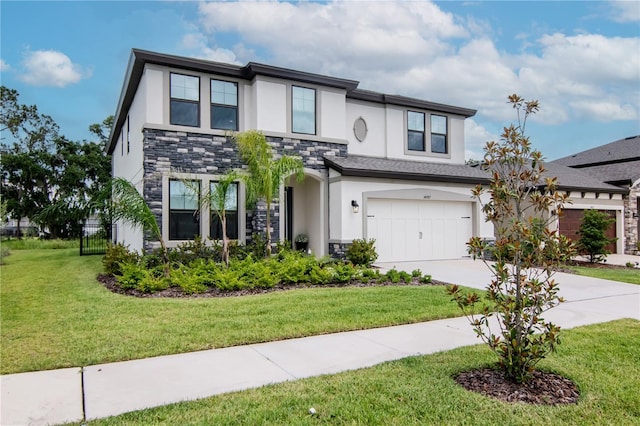 14787 Gallop Run Dr, Lithia, FL 33547 - view of front of house with stucco siding, stone siding, a garage, and driveway