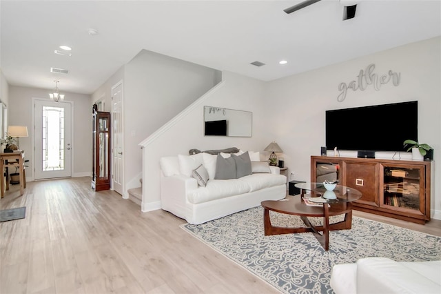 14787 Gallop Run Dr, Lithia, FL 33547 - living area featuring light wood finished floors, stairway, recessed lighting, and ceiling fan