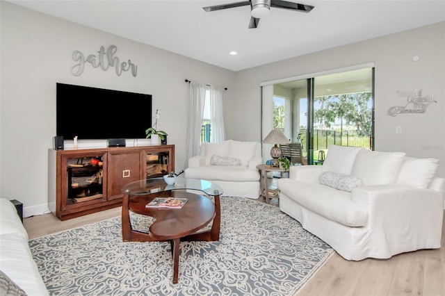 14787 Gallop Run Dr, Lithia, FL 33547 - living room with a ceiling fan, light wood-style flooring, and recessed lighting