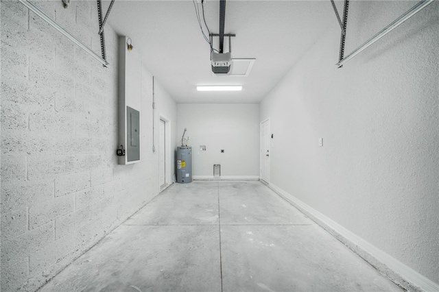 703 Salamanca Ct, Sebring, FL 33870 - garage with electric panel, water heater, and a garage door opener