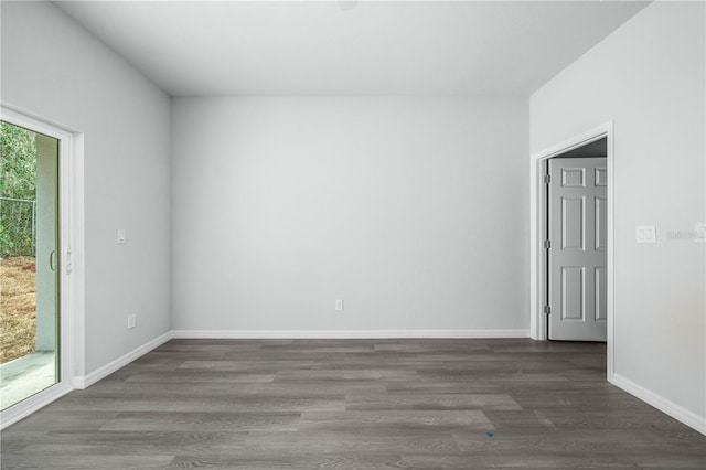 703 Salamanca Ct, Sebring, FL 33870 - spare room featuring wood finished floors and baseboards