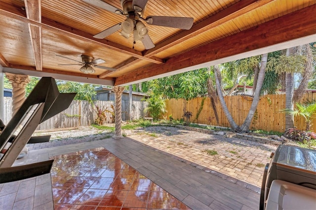 513 25th Ave W, Bradenton, FL 34205 - fenced backyard featuring ceiling fan and a patio area
