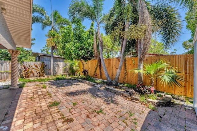 513 25th Ave W, Bradenton, FL 34205 - fenced backyard featuring a patio area