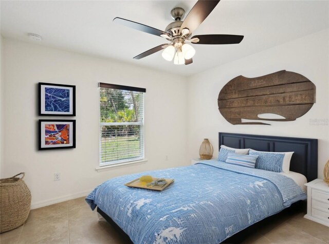 4091 Dull St, North Port, FL 34286 - tiled bedroom featuring baseboards and ceiling fan