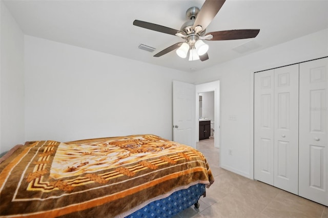 4091 Dull St, North Port, FL 34286 - bedroom featuring a closet, ceiling fan, and light tile patterned flooring