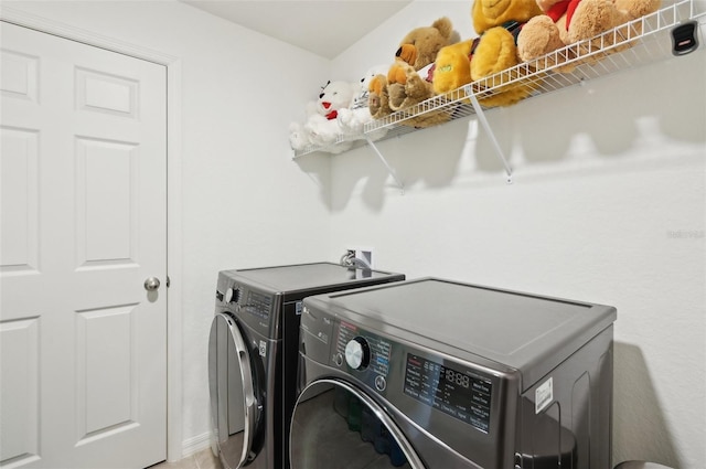 4091 Dull St, North Port, FL 34286 - washroom featuring washing machine and dryer
