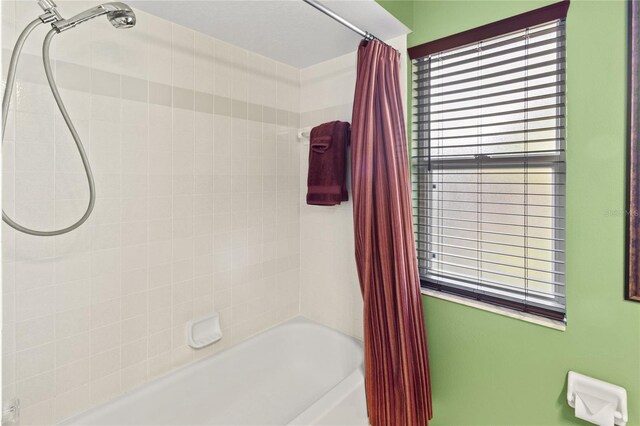 4758 Breezy Pines Blvd, Sarasota, FL 34232 - bathroom with shower / bath combination with curtain