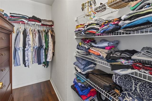 4758 Breezy Pines Blvd, Sarasota, FL 34232 - spacious closet featuring wood finished floors